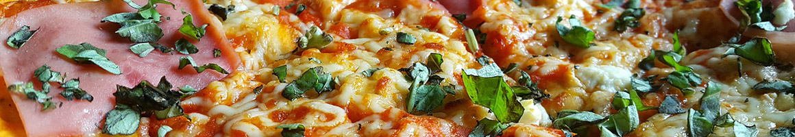 Eating Pizza at Tetaj Brothers Pizzeria restaurant in The Bronx, NY.